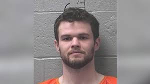 Slain Missouri KKK leader's wife, stepson charged