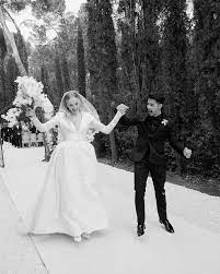 The game of thrones actress walked down the aisle in a stunning custom louis vuitton gown by nicolas. Get A Glimpse Inside Sophie Turner And Joe Jonas S Glamorous Provence Wedding Vogue