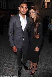 The Look Of Love Amir Khan And Stunning Fiancee Faryal Cuddle Up Ahead Of Giles Deacon S Fashion Show Fashion Cute Outfits Faryal Makhdoom