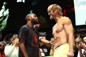 Youtuber logan paul goes the distance with mayweather in boxing clash. U6yeaxfjjhbjnm