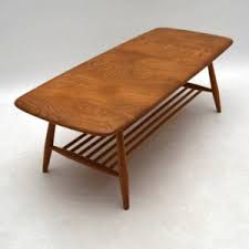 Nest of three square interlocking and stacking coffee tables. 1960 S Vintage Ercol Coffee Table In Solid Elm Retrospective Interiors Retro Furniture Vintage Mid Century Furniture Vintage Danish Modern Furniture Antique Furniture London