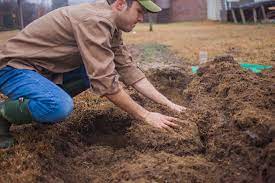 If the root is embedded deeply into the ground, you may need to dig up more soil around the root. How To Dig A Garden Patch Using Only A Shovel Manmadediy
