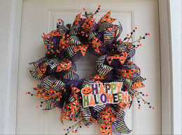 Elegant black and white gets the halloween treatment with yarn and a wreath form. Diy Mesh Happy Halloween Wreath The Wreath Depot