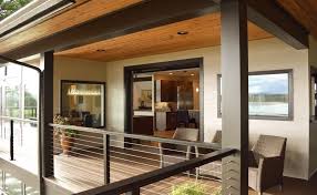 Including a wooden handrail is a great way to blend your cable deck railing into the natural environment surrounding it. Railfx S Guide To Cable Railing Spacing Railfx Blog