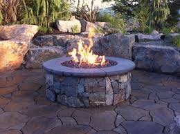 Fire tables typically use propane or natural gas and have an area around the fire where you can put food and drinks, according to the hearth, patio and barbecue association. Fire Pits Traditional Patio Seattle By Custom Fire Art Llc Houzz