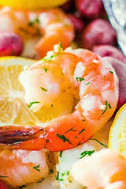 In a baking dish, combine potatoes, corn, 2 garlic cloves, 1 tablespoon of oil, and ½ tablespoon of the cajun spice mix. Seafood Boil Foil Packets Homemade Hooplah