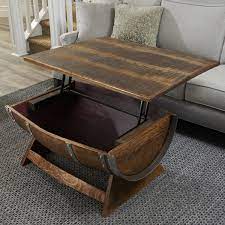 After he decided on a design, he got to work cutting down the wine corks so they would all be the same. Lift Top Reclaimed Wine Barrel Coffee Table