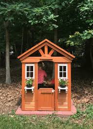 And the wood roof with sunburst gables gives the playhouse that extra touch of class. A Little Wooden Playhouse In The Woods Young House Love