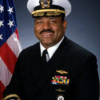 Retired Chief Petty Officer Carl E. Clark delivers