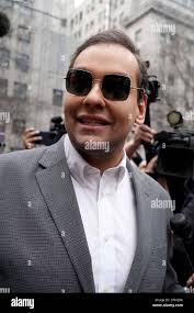New York, USA. 3rd Apr, 2023. George Santos joins protestors and speaks  with media and Trump supporters during a demonstration in support of Donald  Trump prior to Trump's indictment, outside the New