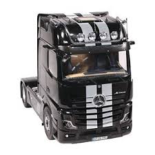An alternating glance at both displays. Mercedes Benz Actros 4x2 Giga Space Truck Tractor Black Stripe New Mirror Cam Design Diecast Car Hobbysearch Diecast Car Store