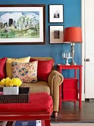 A Palette Of Blue Red And Yellow Make For A Dramatic And Lively Living Area Via Bhg Com Living Room Red Living Room Color Schemes Living Room Color