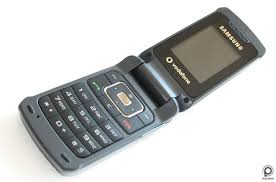Samsung M310 - tiny case, few features ...