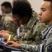 Afghan Uniform Police Sgt. Mohammad Dawood examines