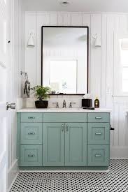Love This Minty Almond Green Cabinet Under The Marble Sink With Black Framed Mirror White Sconces And Small Bathroom Decor Chic Bathrooms Bathrooms Remodel