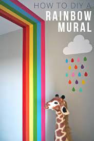 A huge collection of inspirational kids bedroom decor schemes that feature beautiful pastel color palettes of blush pink, light blue, pea green and sunshine yellow. How To Diy A Rainbow Mural In Your Child S Room With Decorators Tape Tester Pots Melanie Lissack Interiors Rainbow Room Kids Kids Rooms Diy Rainbow Room Decor