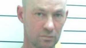 White supremacist killer back in jail