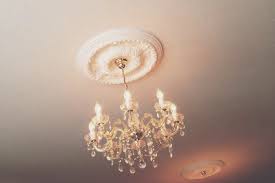 We offer ceiling fan medallions in a variety of styles, each utilizing different materials, design, size, color, and finish. How To Find The Right Ceiling Medallion Ceiling Medallion Chandelier Modern Ceiling Medallions Ceiling Medallions