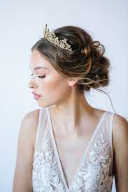 10 Ways To Rock A Tiara On Your Wedding Day Bridal Hair And Makeup Tiara Hairstyles Bridal Hair Updo