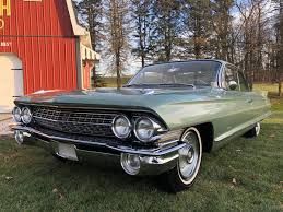 Image result for Platinum Gray 1961 Cadillac