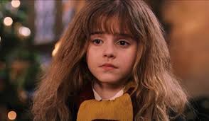 Did Emma Watson wear a wig in her role as Hermione in the Harry Potter film  septology?
