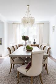 So, let's take a look at 15 of my favorite dining room chandeliers to help you create your dream dining room. Elegant And Light Dining Room Ralph Lauren Table Lamp Capiz Shell Chandelier Interior Design By Elegant Dining Room Stylish Dining Room Dinning Room Design