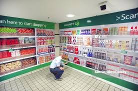 The Walls Of Sydney S Town Hall Station Are Bedecked To Resemble A Supermarket Shopping Technology Marketing