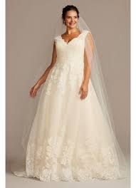 We just cannot imagine this outfit without the heavily embroidered bodice. Scalloped Lace And Tulle Plus Size Wedding Dress David S Bridal