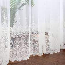 Lace curtains give you a fair amount of privacy, since the lace curtain panels tend to be more textured then a typical sheer curtain. White Lace Sheer Curtain Add Peace And Comfort In This New Season Curtains White Lace Curtains Interior Textiles