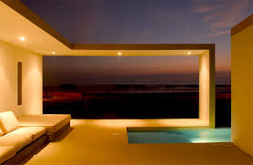 These homes typically include large windows to take in views, square footage dedicated to outdoor living spaces, and oftentimes the main floor is raised off the ground on a stilt base, so floodwaters or waves do not damage the property. Modern Small Beach House Design In Peru By Javier Artadi Arquitecto Digsdigs