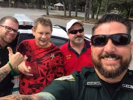 Deputies Jacob Hawkins and Chris Padgett recently met Mike McCrea who has  dreams of becoming a law enforcement officer. They made this Keystone  Heights resident's day and presented him with an honorary