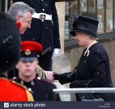 The public funeral of queen elizabeth the queen mother occurred on tuesday, 9 april 2002 in westminster abbey in london, following her death on 30 march 2002 at the age of 101. Her Majesty Queen Elizabeth Ii Shakes Hands With The Dean Of Stock Photo Alamy