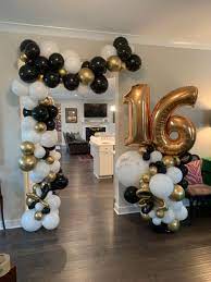 My clients mother did not get to celebrate her 60th so she wanted to throw her an amazing party for her 61st birthday and contacted me for decor. Sweet 16 Balloon Column And Garland Black And Gold Party Decorations Black And Gold Balloons Gold Party Decorations Diy