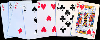 Take two of the cards and orient them so that they are next to each other, with the slits on the cards facing each other. Playing Card Maths