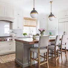 When space is luxury for you in the kitchen you must definitely opt for the the kitchen island can be very useful for the open kitchens and this is way useful when you have dining room attached. Gray Kitchen Island With Thick Butcher Block Countertop Cottage Kitchen