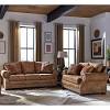 This tufted, square ottoman is a great piece to round out your living room ensemble. 3