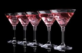 The martini glass in this 4 pieces drinking glass set is casual yet elegant with their cinched design. Red Cocktail In Martini Glasses Isolated On Black Stock Images Page Everypixel