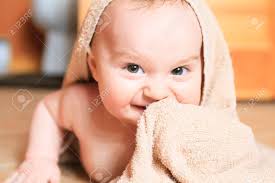 When the herbal bath is brewed and added to bathtub water, it turns the water a dark yellow/brown color. Small 8 Months Baby After Bathing On The Floor Stock Photo Picture And Royalty Free Image Image 36561086