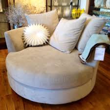 called a cuddle chair and it rocks and swivels getting this for my space living room decor inspiration cuddle chair beach lounge chair