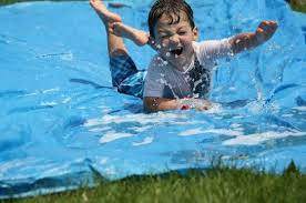 Step by step guide find a good location. Easy Homemade Water Slide For The Backyard Happy Hooligans