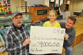 Hales present check to New England Wildlife enter