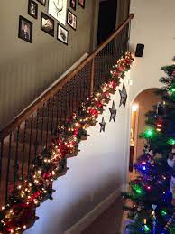 Love The Garland At Bottom Of Banister To Keep Hand Rail Free For Kids And Guest Christmas Stairs Decorations Christmas Staircase Christmas Banister