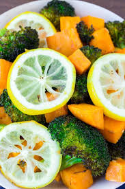 Toss together sweet potatoes, cauliflower, 3 tablespoons olive oil, salt and pepper on a rimmed baking sheet. Lemon Roasted Broccoli Sweet Potatoes Delicious Little Bites