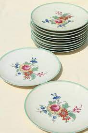 Ivory floral ornament area rug. Vintage Bavaria China Thomas Ivory Salad Plates Mint Green Border Center Floral