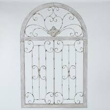 Awesome home decor!metal wall hanging measures approximately 2 feet long, 3 inches wide, and 2 feet tall. Metal Window Scroll Wall Decor