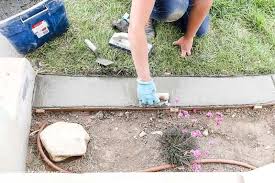Simply grab some old logs, laying them out how you want. Install Concrete Landscape Edging Aka Concrete Border Twofeetfirst