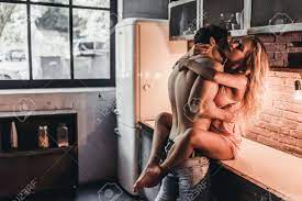 Couple sex in kitchen