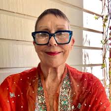 Quite possibly the most pleasing part of our window display! Folks passing  take pictures of themselves as the light outside reflects their image for  photos, sometimes for funsies if one of us