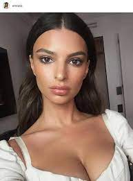 Emily Ratajkowski shows off cleavage in stunning red dress at Paris Fashion  Week show after posting busty selfie | The Irish Sun