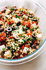 Mediterranean couscous salad is full of bright fresh flavors with a crazy easy homemade dressing! Roasted Garlic Italian Couscous Salad Recipe Little Spice Jar